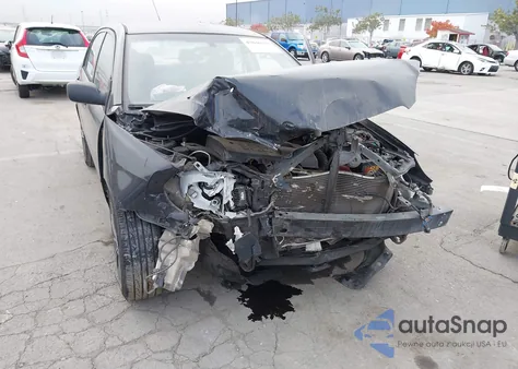 2004 Toyota Corolla Le from USA, damaged, VIN 1NXBR32E34Z302384